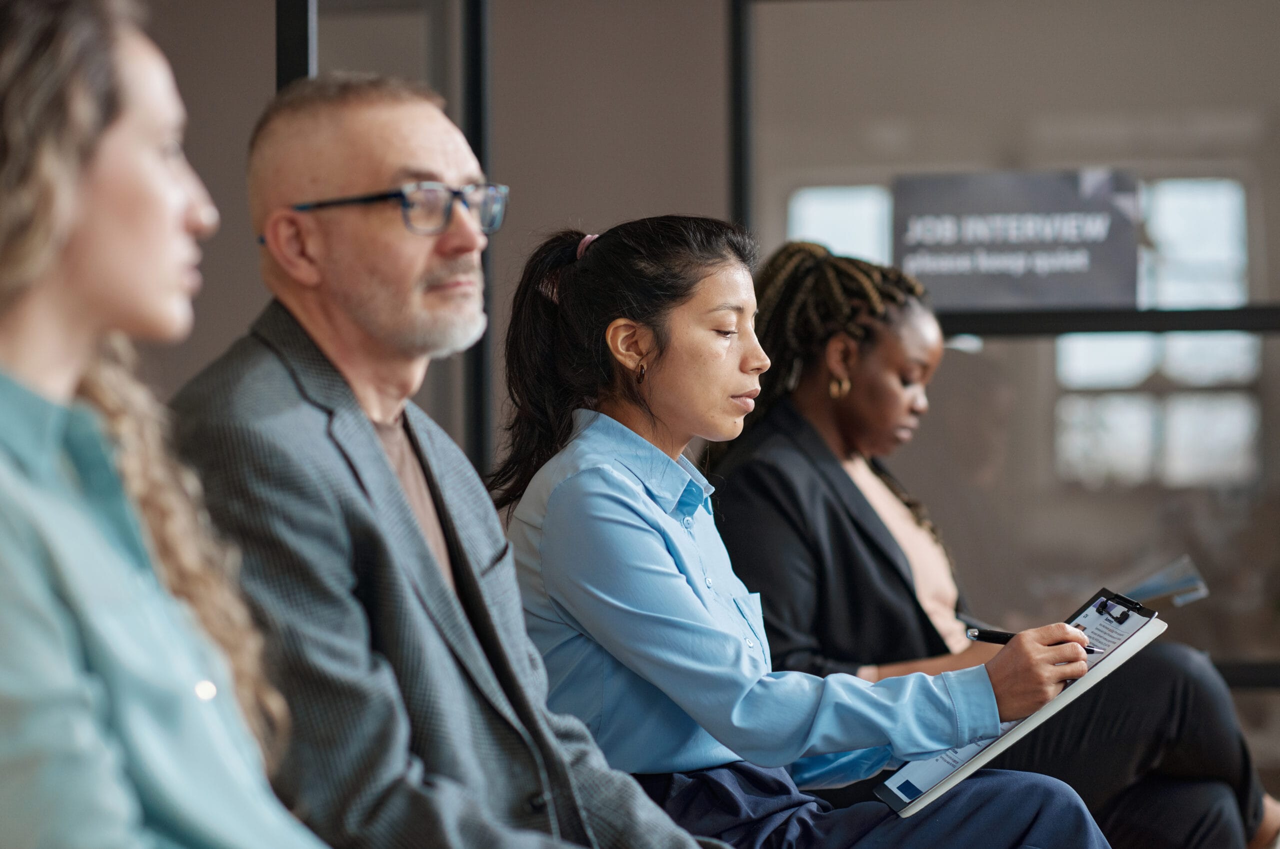 Woman filling resume form for interview